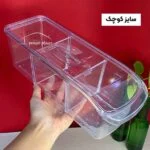 باکس یخچالی سایز کوچک گذاشته شده روی میز با بک گراند قرمز